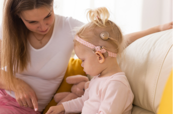 Mom and daughter that wear a cochlear implant